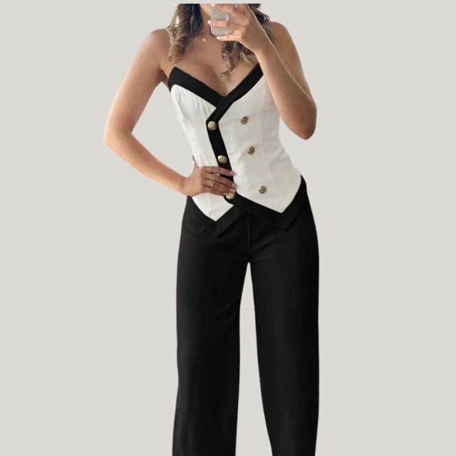 Stilla | Chic dobbeltradet vest med kontrastbukser Mode
